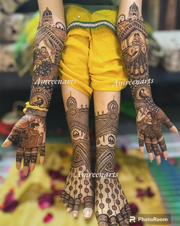 A breathtaking full bridal set, featuring story-telling portraits on the arms and intricate matching patterns on the feet for a complete regal look.