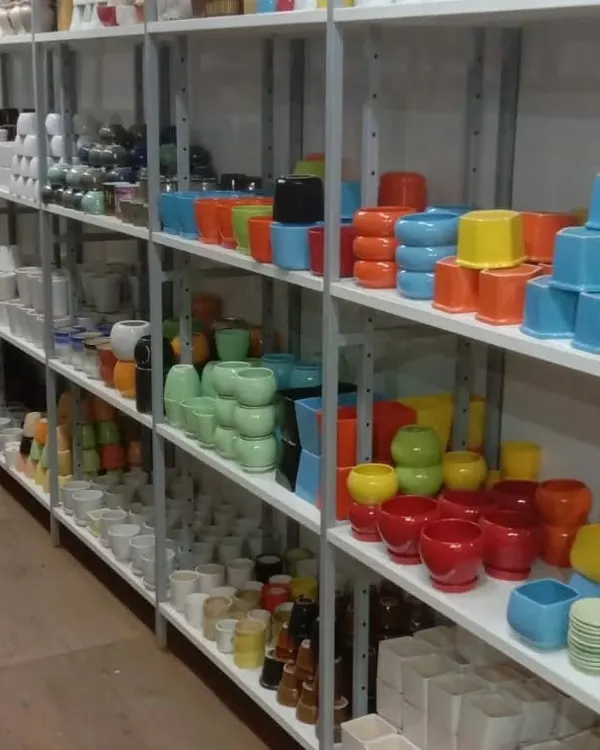 Our shelves are stocked with a wide array of colorful ceramic pots. We carry various shapes and sizes, from small desktop planters to larger statement pieces.