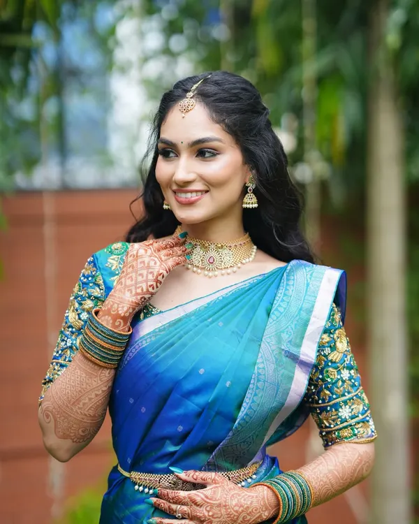 This is my signature soft glam look, perfect for an engagement. I focused on creating a flawless, dewy base that lets the skin's natural texture shine through, paired with defined eyes and a warm smile to capture her radiant energy.