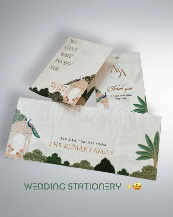 When every detail matters, we create coordinated wedding stationery. This set includes custom-designed money envelopes, thank you tags, and key holders, all featuring a beautiful peacock and botanical theme to match the main invitation.