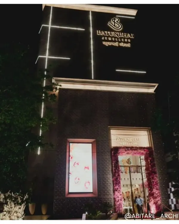 The grand facade of Batukbhai Jewellers in Nagpur, illuminated at night. Our architectural design aimed to create a landmark destination that communicates luxury and permanence, drawing clients in from the moment they arrive.