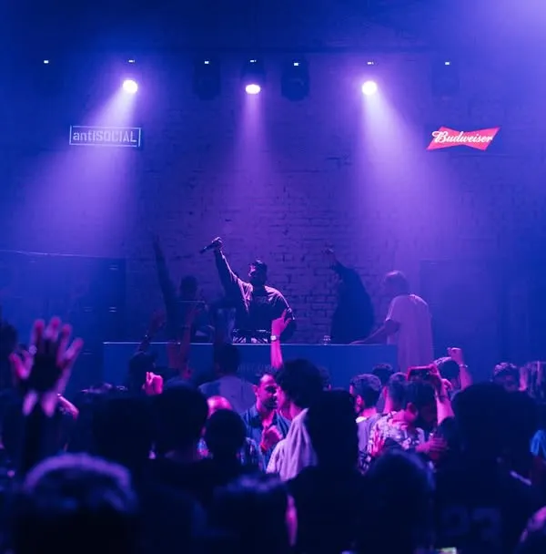 The view from the stage at the Homegrown 'Back to School' 90s party. A packed house at antiSOCIAL, with everyone raising their hands for the classic tracks.