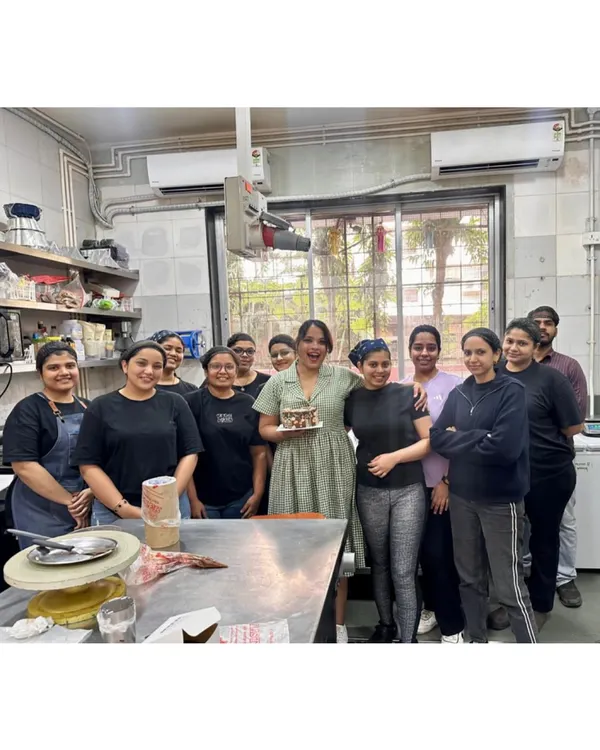 A happy moment with the whole Maska team celebrating my birthday in the kitchen. This is my family, and their dedication and joy are the secret ingredients in every cake we make.