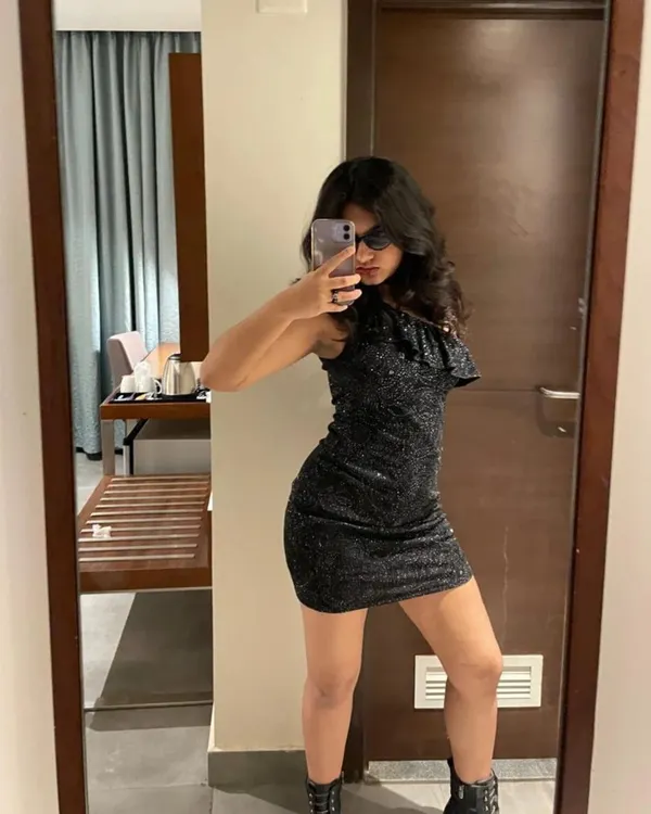 A quick mirror selfie before heading out to a show. This is my pre-show ritual, feeling the look and getting into the right mindset to perform.