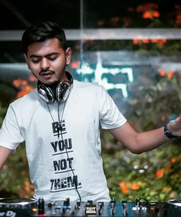 "Be you not them." This is a motto I live by. This photo captures me in my zone, focused on the music and staying true to my own style behind the decks.