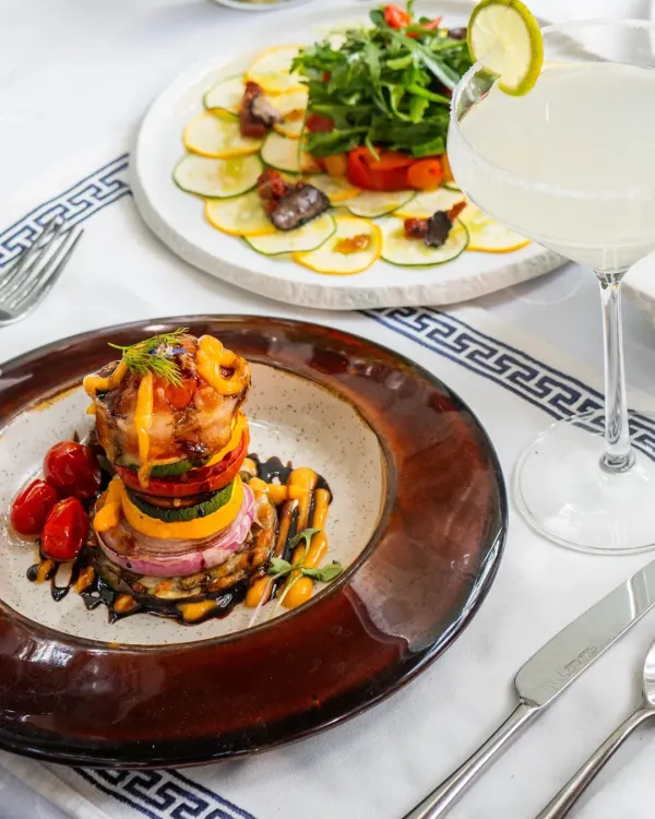 A tower of slow-roasted garden vegetables, a dish that is both healthy and full of earthy, rustic flavor, inspired by the fields of Andalusia.