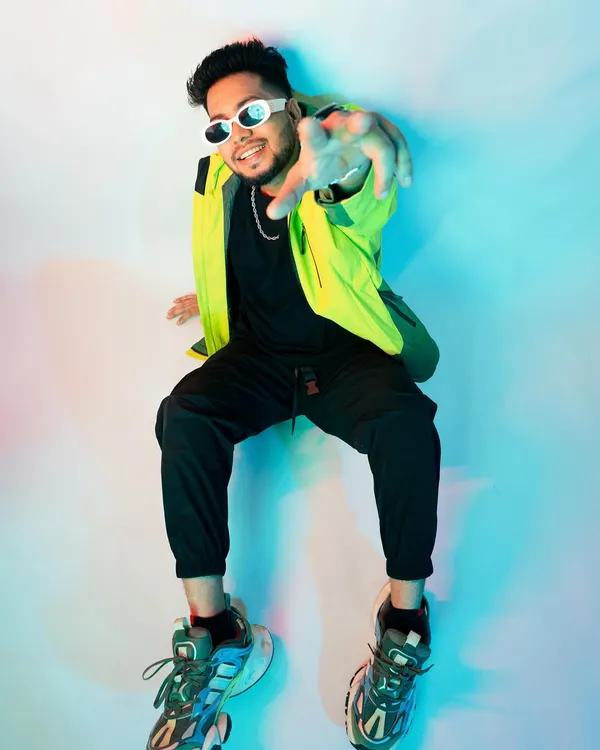 A high-energy shot from one of my recent photoshoots. This is the vibe I bring to my music, always ready to make something big happen.