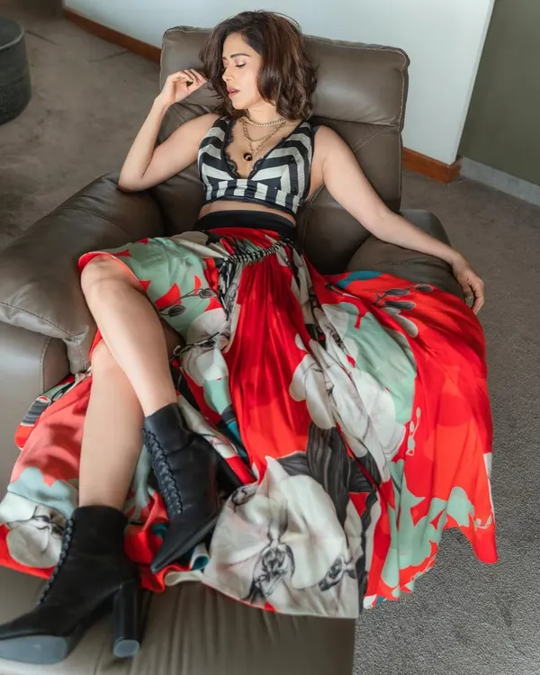 Nushrratt Bharuccha ready for a pool party. I paired a graphic print skirt with a striped crop top and combat boots for an edgy, unexpected look.