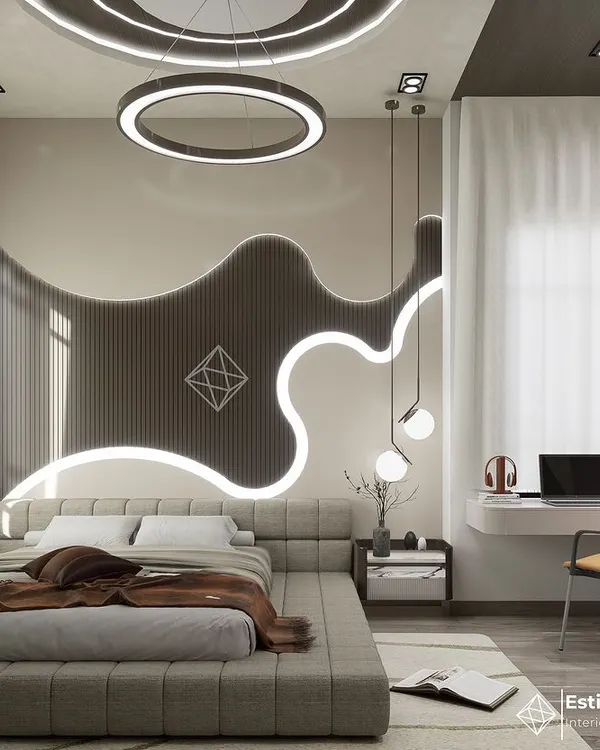 This bedroom is a showcase of modern design, where bold, organic curves and integrated LED lighting create a dramatic feature wall. The space is designed as a complete suite, with a floating desk and chair creating a functional home office nook.