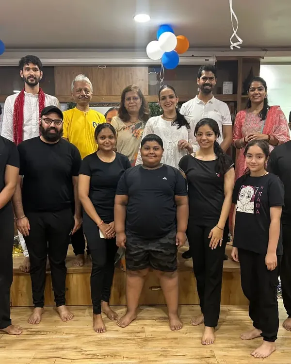 Welcome to the Nikki Yoga Studio family. This group photo from our Yoga Day celebration shows the diverse and close-knit community that practices together and supports one another.