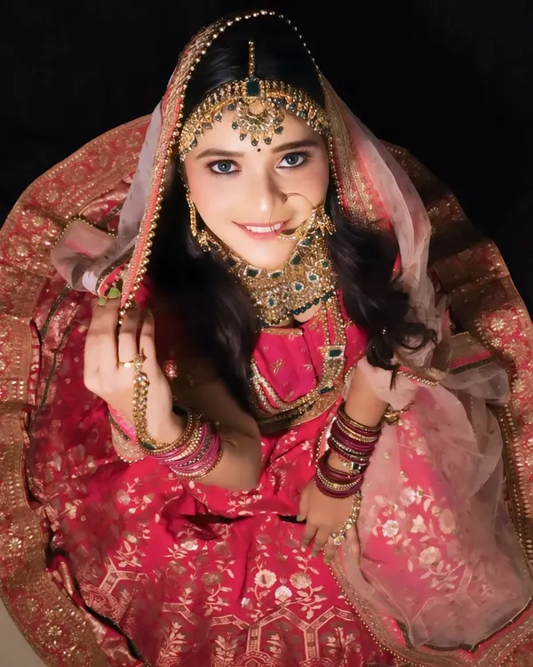 A complete North Indian bridal look created during one of our workshops, showcasing intricate jewelry setting and a radiant makeup base.