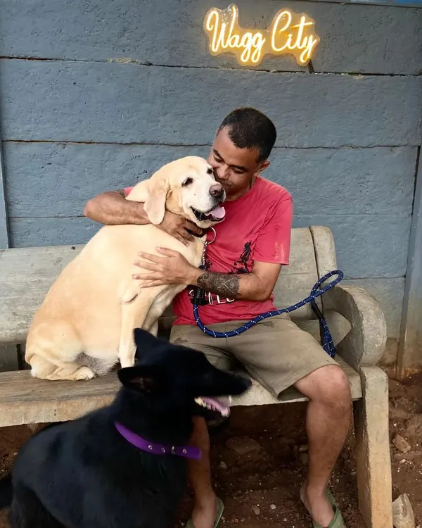 A hug for Cookie before he left us. This is what we do. We build real bonds with the dogs in our care. You're not just a number here.