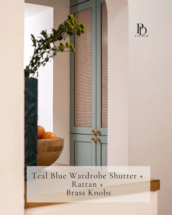 I love pairing different materials to create a unique look. This teal blue wardrobe shutter with a rattan insert is finished with delicate brass knobs, a combination that feels both modern and timelessly elegant.