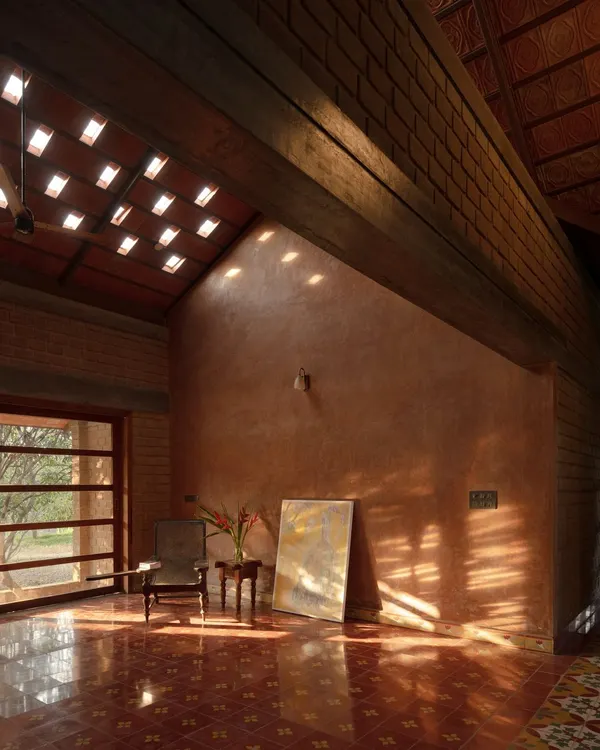 We believe light is a building material. Here in our Kaattu Veedu project, sunlight filters through the tiled roof, creating an ever changing pattern of light and shadow on the lime plastered walls, making the space feel dynamic and warm.