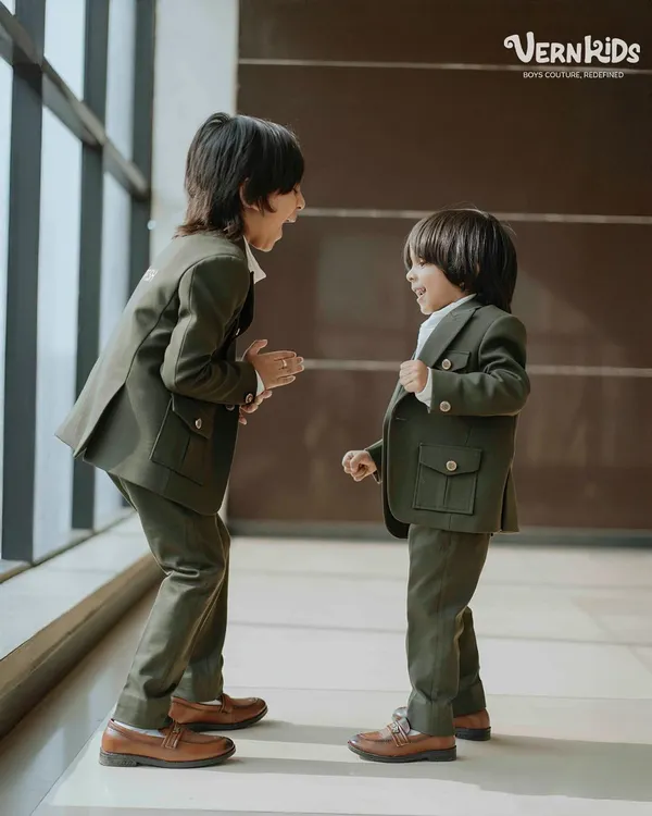 When your brother is your first best friend and your built-in style twin. Prish and Aarsh are having fun in their matching olive green shacket sets, personalized just for them.