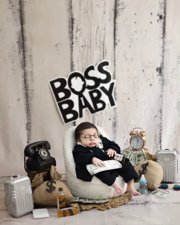 Ready for a board meeting. This 'Boss Baby' themed shoot is always a hit, complete with a tiny suit, briefcase, and plenty of attitude.