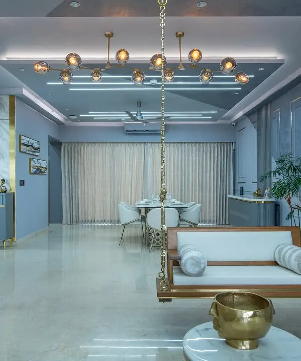 This living space is designed to make you want to sit down, exhale, and just be. I believe luxury isn't about being loud; it's about creating a sense of calm and balance. Here, rich blue tones, soft lighting, and a mix of textures come together to create a room that feels both elegant and incredibly comfortable.
