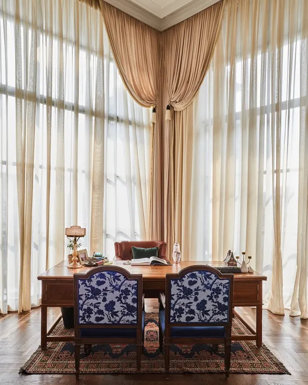 In the founder's cabin of the Maddock office, we blended antique finds with personal history. The centerpiece is a magnificent 8-foot antique desk, complemented by the founder's very first office chair, which we retained for sentimental value. The space is a narrative of the company's journey.