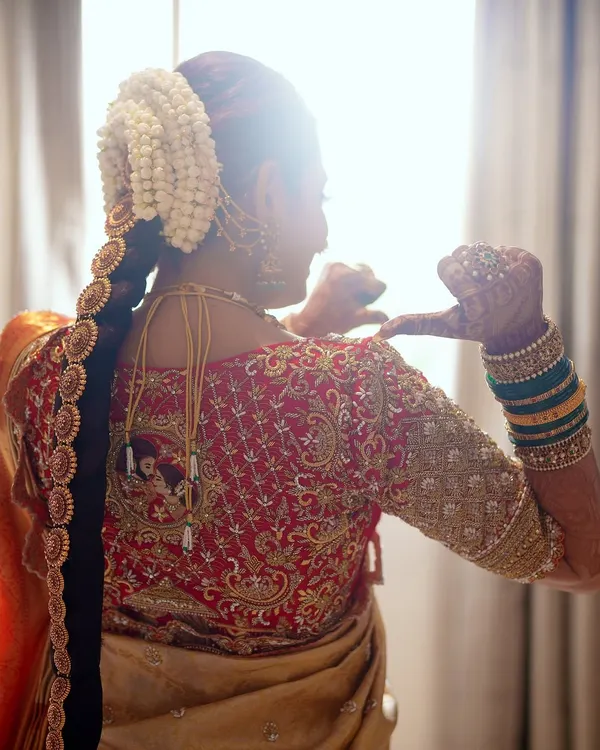 The back of a bridal blouse is just as important as the front. For Sonal Monteiro's wedding, I designed this intricate pattern with heavy zardosi and beadwork, ensuring she looked stunning from every angle.