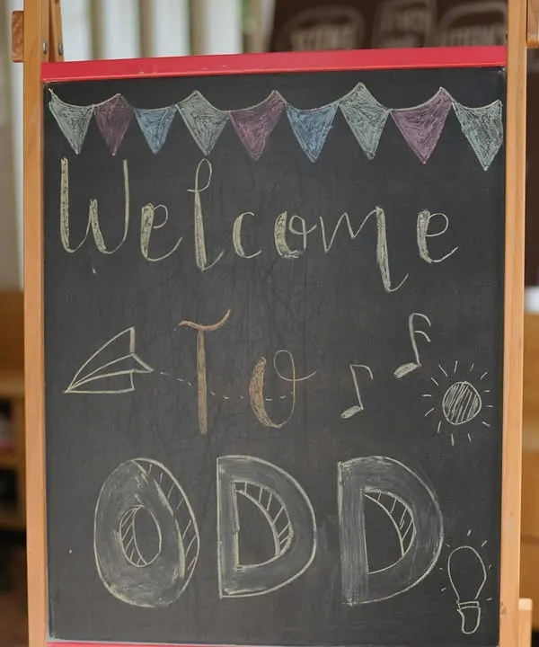 A cheerful chalkboard sign welcomes everyone to our center. I believe in creating a warm and inviting atmosphere from the moment you walk in the door.