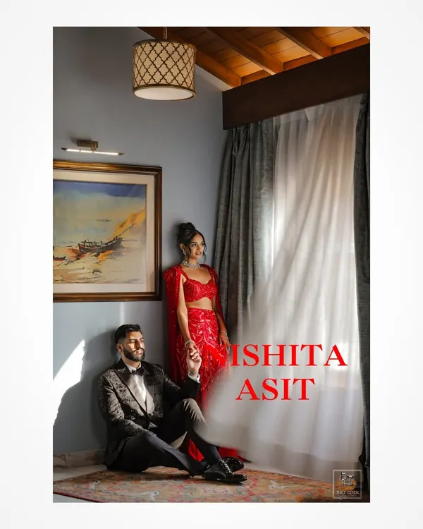 A stylish and moody portrait of the couple in their glamorous reception outfits in Goa.