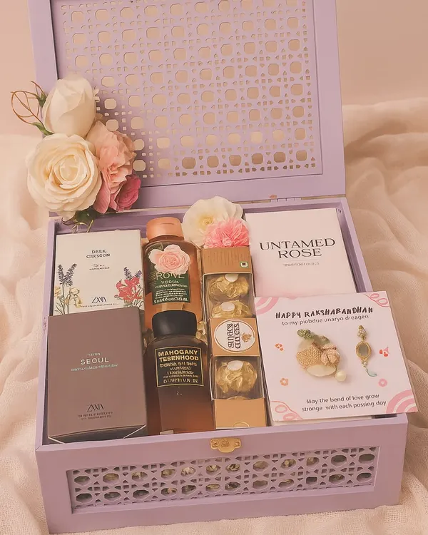 A perfect Rakhi gift for your Bhaiya and Bhabhi. This luxurious lavender box includes matching Zara perfumes, Bath & Body Works shower gels, Ferrero Rocher, a reed diffuser, and a beautiful couple rakhi set.