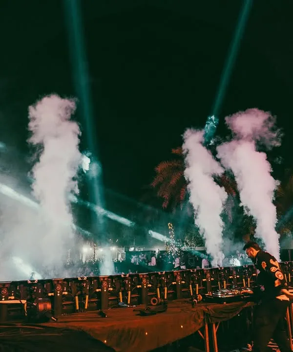 The calm before the storm, surrounded by CO2 cannons and stage lights. This is my office, and I'm ready to make it an unforgettable night.