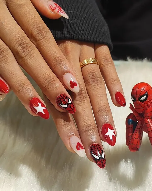 Your friendly neighborhood nail artist reporting for duty. I had so much fun creating this Spiderman-themed set, with detailed hand-painted masks, webs, and logos for the ultimate fan.
