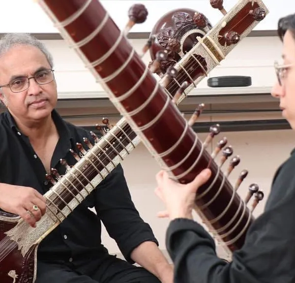 Teaching is about sharing a tradition that is larger than any one of us. Here I am during a masterclass in Niigata, Japan, guiding a dedicated student through the nuances of the sitar and the Maihar parampara.