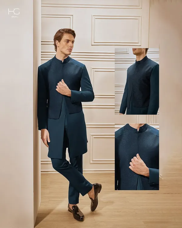 This layered teal achkan showcases my approach to modern tradition. I combined dual fabrics and intricate jacquard detailing to create a piece that is both bold and timeless, perfect for a groom or a grand celebration.