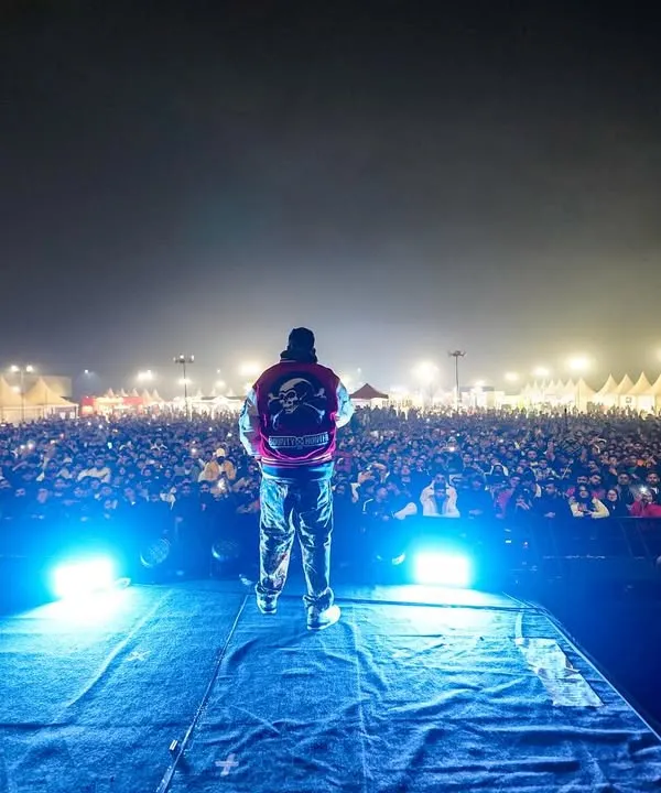 Facing a sea of fans, this is the view from my office. I command the energy of the biggest crowds, making sure every single person feels the beat.