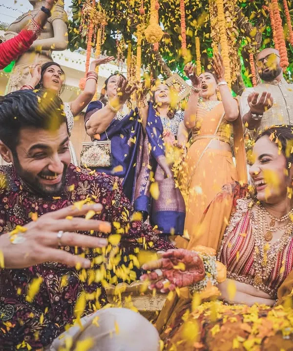 A burst of marigold petals and pure joy. Bhavita and Niel's Haldi was a vibrant, energetic celebration, and we were there to catch every happy moment.