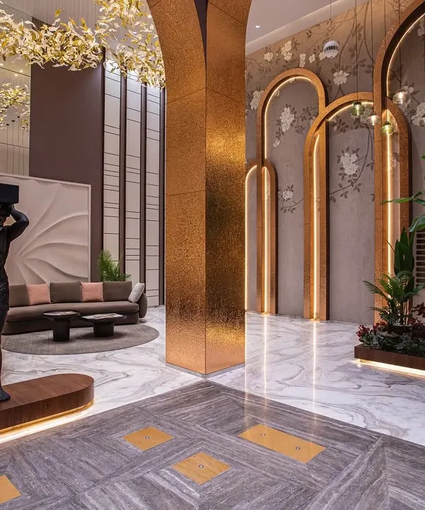 We believe the first impression is a lasting one. This lobby in Surat was designed to evoke a sense of grand arrival, where opulent materials and sculptural forms converge to set a tone of understated luxury. The interplay of metallic arches, ambient lighting, and curated art establishes a powerful identity for the space.