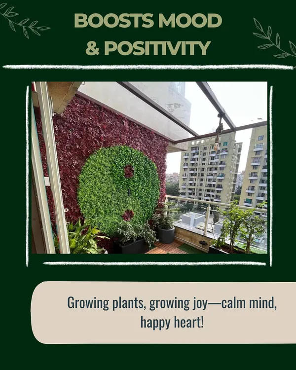 A vertical garden is more than just decor; it's a mood booster. This yin-yang design, made from red and green artificial foliage, brings a sense of balance and positivity to a balcony.