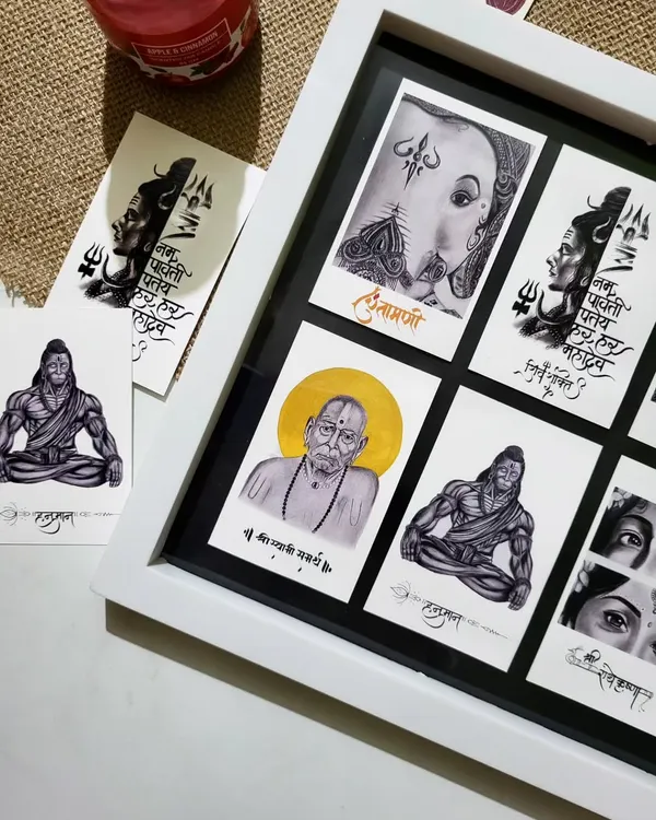An angled view of the framed postcard collection. This shows how the black mounting paper makes the individual monochrome and gold-accented artworks pop, creating a striking piece of home decor.