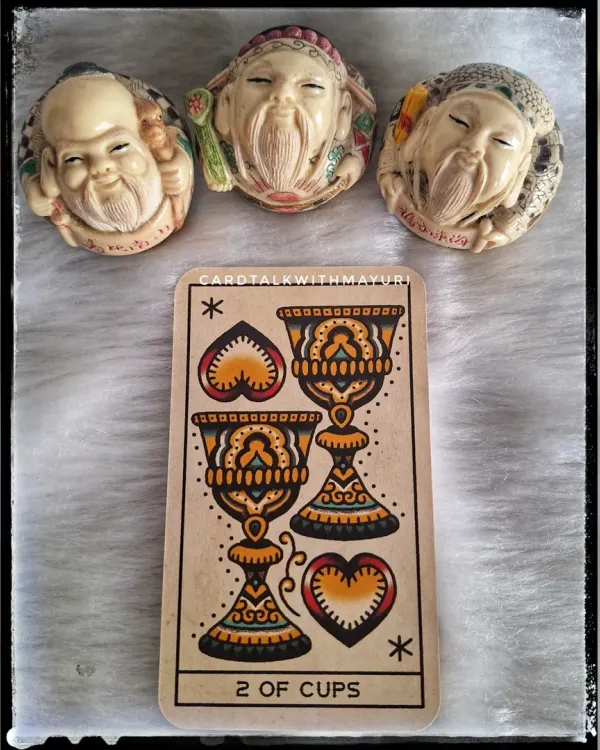 A March forecast with the 2 of Cups, signaling a month of love, healing, and new relationships. The affirmation: "I embrace this new chapter of my life with open arms."