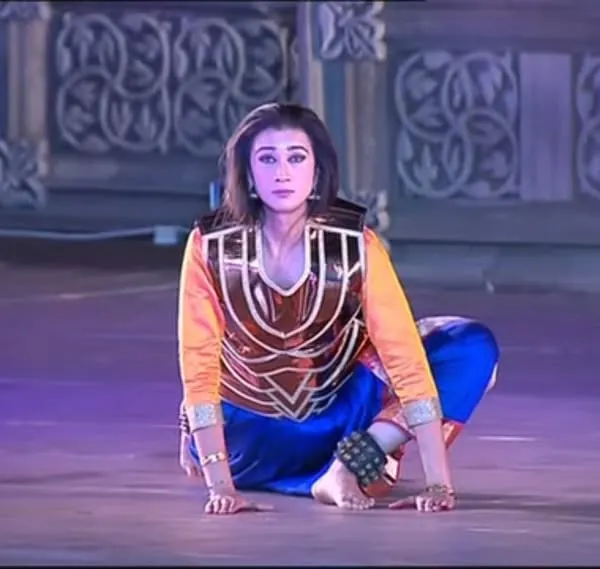 A moment from my dance drama "The Wheel of Choices" at the Khajuraho Dance Festival. Here, I am portraying a character with an intense, grounded pose that communicates strength and determination.
