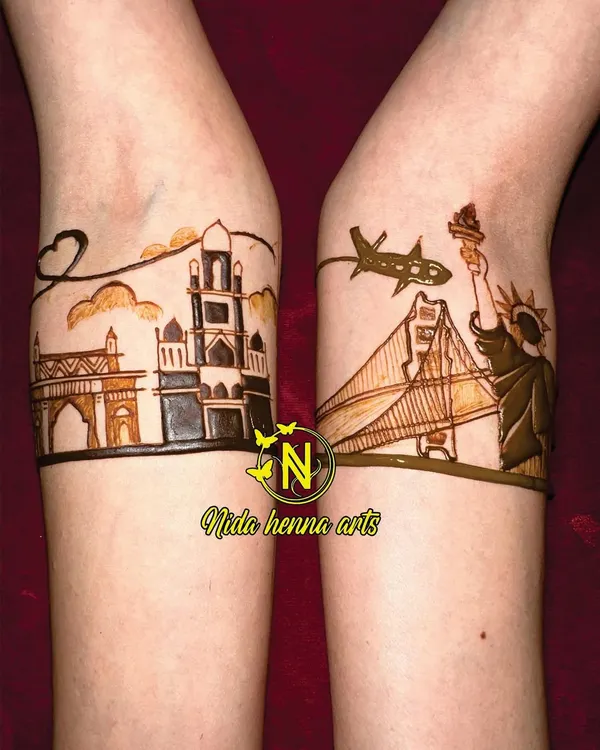 This design was for a long-distance couple. We featured the Mumbai skyline on one arm and the New York City skyline on the other to represent their two worlds coming together.