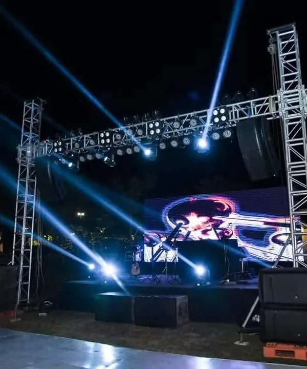A massive stage setup for a New Year's Eve gala at The Ranch. For large outdoor events, I bring in heavy-duty sound and light trusses to create a concert-level experience.