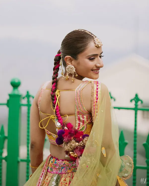 My bride Vasav was a dream for her Haldi. We created a soft, minimal makeup look but added a playful purple winged liner for a pop of fun. The real showstopper was her beautifully pleated parandi choti, adding the perfect traditional charm.