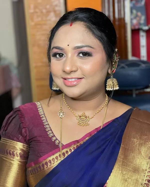 This is what I mean by a natural glow and skin finish makeup. Her skin looks radiant and healthy, not covered up.