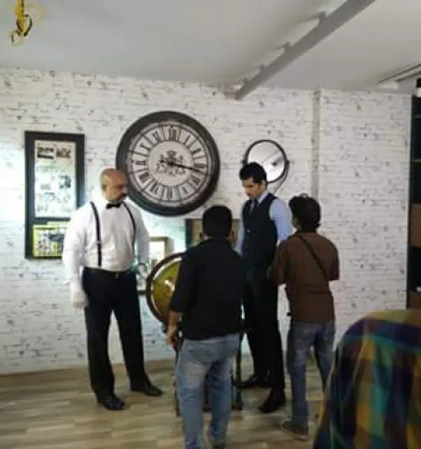 This is the energy I bring to every set. Here, I am directing the wardrobe for an international perfume ad, ensuring the costume styling perfectly captures the character and brand essence. My on-set presence means every detail is camera-ready.