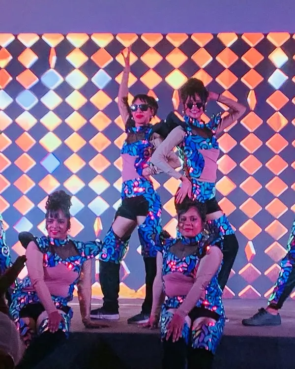 Our dance troupe in custom-designed LED costumes, a perfect choice for corporate theme party dancers. This high-energy performance uses synchronized lighting and choreography to create a futuristic and visually stunning show for product launches or awards nights.