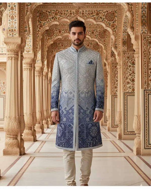 This is the kind of entrance you want to make. My stunning ombre sherwani, with its intricate geometric embroidery, is designed for the modern groom who appreciates tradition but isn't bound by it. It’s a statement piece for your big day.