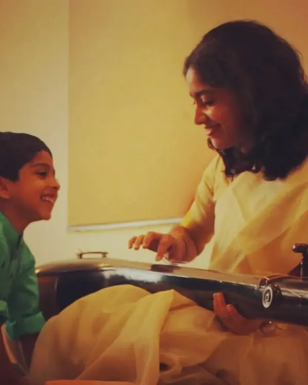 "Music and Children are my life." A candid moment of me, Madhumita, sharing a smile with a young student. These moments of connection are what I cherish the most.