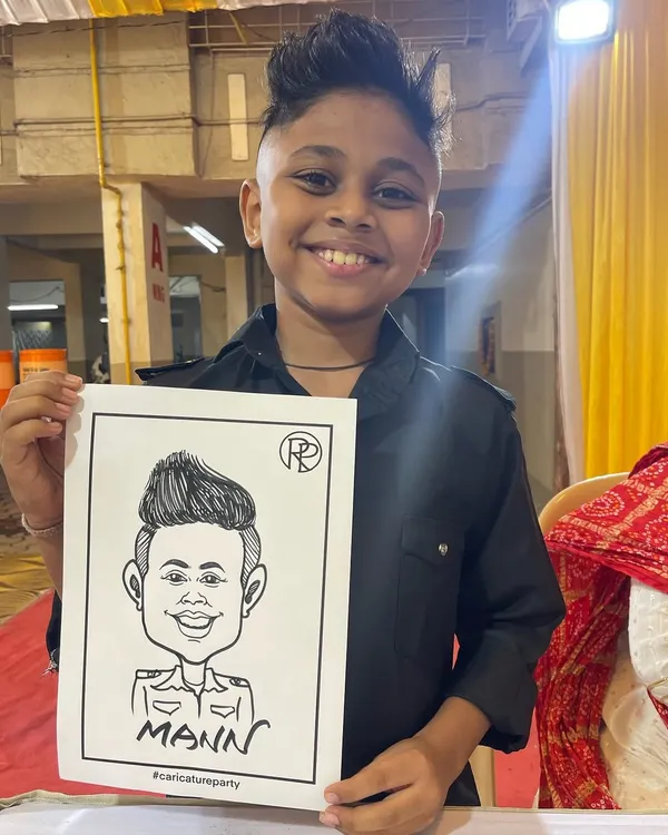 It's always a blast drawing for kids. I loved capturing this young man's cool style at a Haldi event in Panvel. Caricatures are a fantastic and fun activity for children's parties.