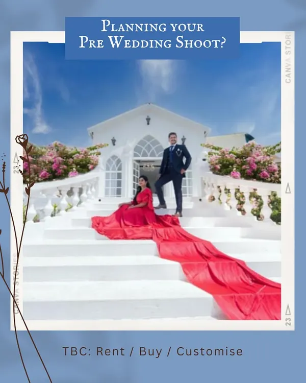 Make a grand statement with this fiery red trail gown against a stunning white architectural backdrop. This is one of our most popular rental looks for pre-wedding shoots, offering a powerful and cinematic visual. The groom's classic suit completes this elegant couple's portrait.