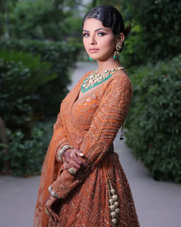 A professional shot of a model adorned with my party henna. This elegant and minimal design is perfect for guests who want to look festive and chic.