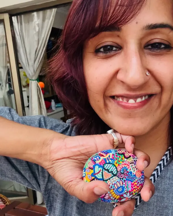 A selfie with my 'joy pebble'. This is the face of someone who just spent time in her creative flow, and I couldn't be happier.