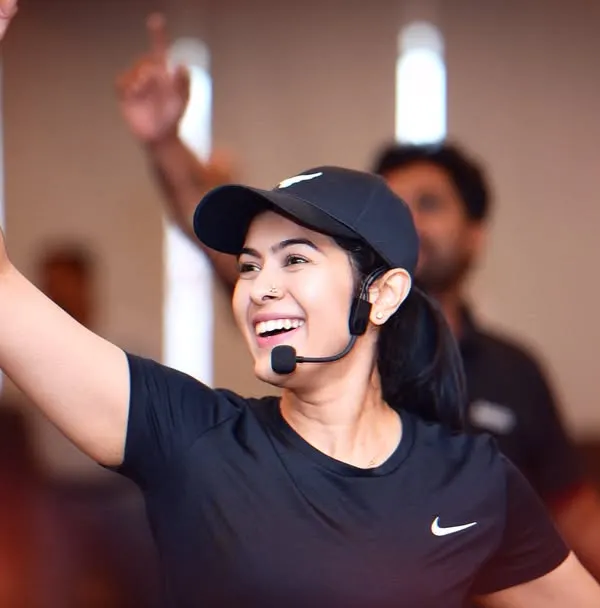 I believe wellness at work should be vibrant and engaging. Here I am leading a corporate Zumba session, bringing energy and fun to the workplace to boost morale and team spirit.